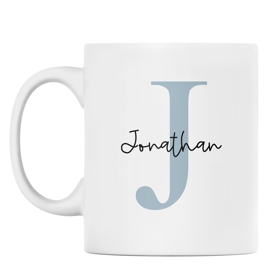 White mug with a blue letter 'J' and name 'Jonathan' on a white background
