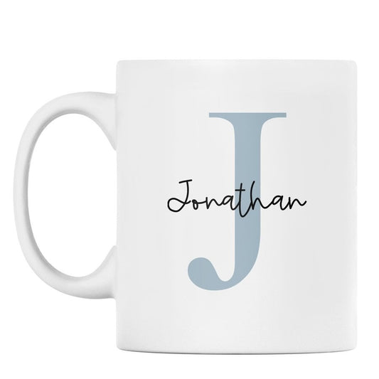 White mug with a blue letter 'J' and name 'Jonathan' on a white background