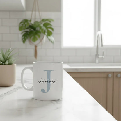 White mug with 'Jonathan' printed on it in a kitchen setting