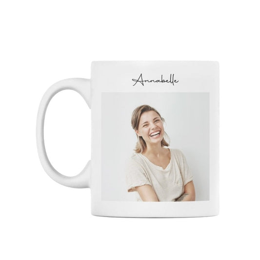 White mug with a photo of a smiling woman and the name 'Annabelle' on a white background