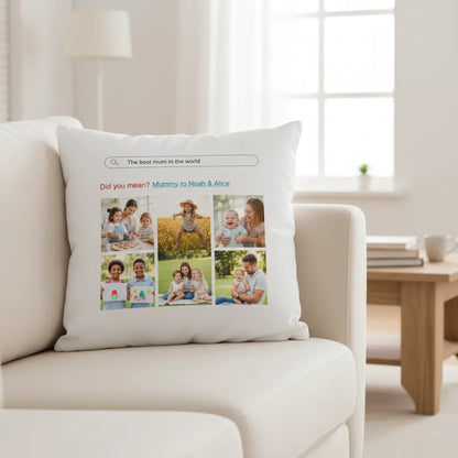 Decorative pillow with family photos and text on a white couch in a living room.