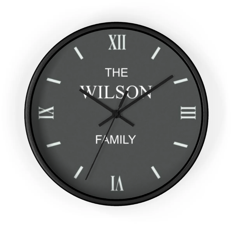 Black wall clock with 'The Wilson Family' text on a white background