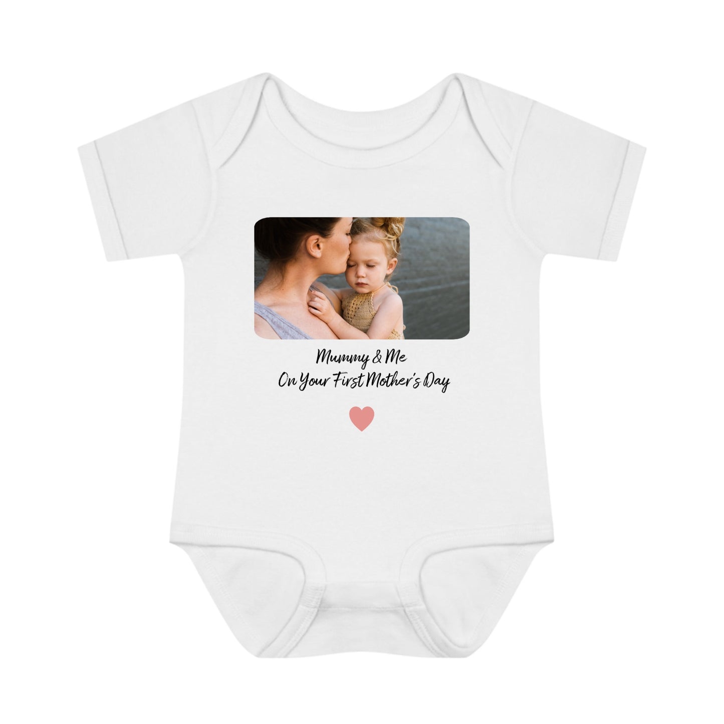 White baby onesie with a printed photo of a mother and child on a white background