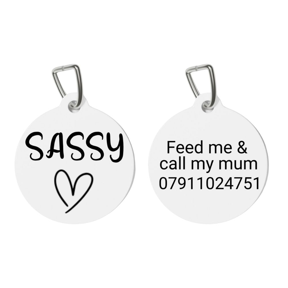 Two white pet tags with text on a white background