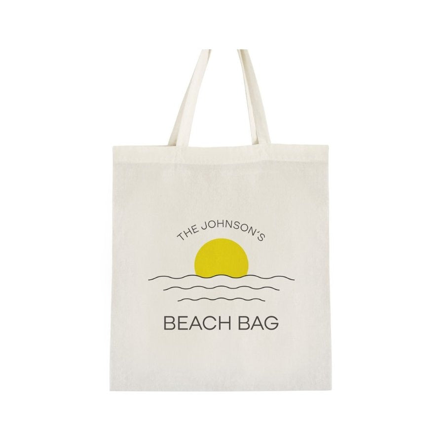 Beach bag with sun and wave design on a white background