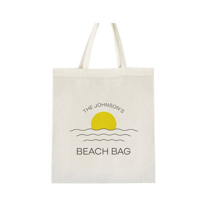 Beach bag with sun and wave design on a white background