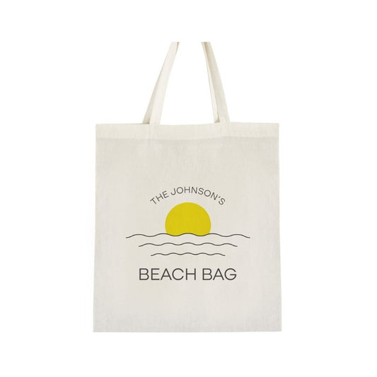 Beach bag with sun and wave design on a white background
